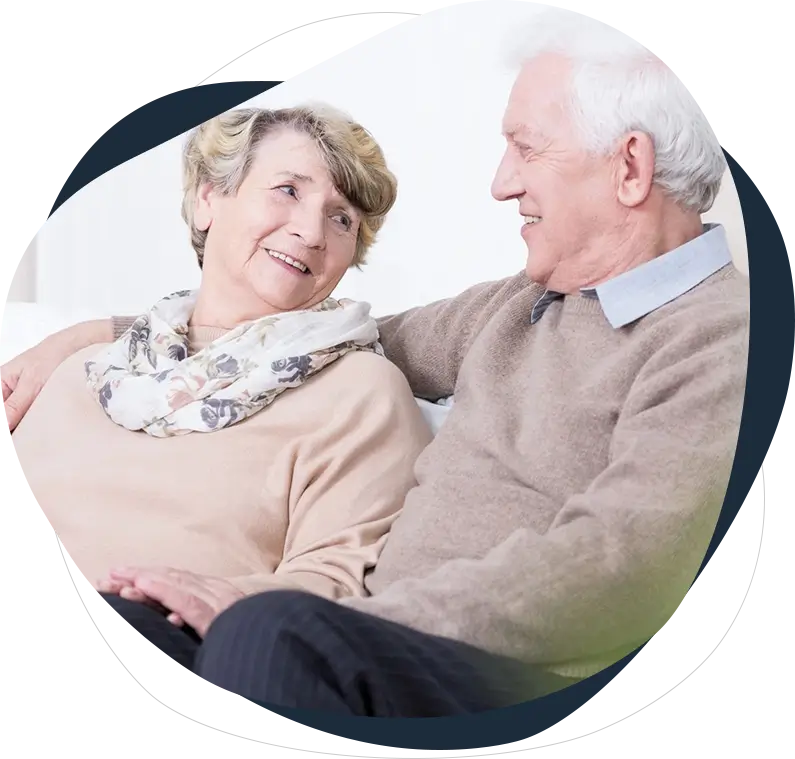 A man and woman sitting on the couch