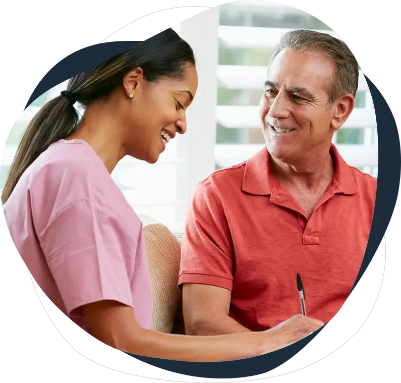 A man and woman smiling for the camera.