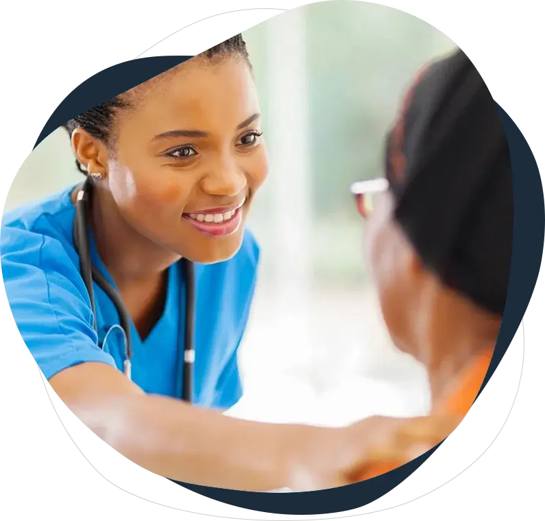 A woman in blue shirt talking to someone.
