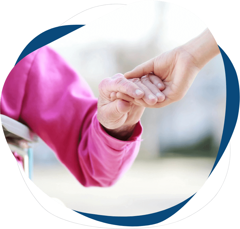 A person holding another persons hand in the palm of their hand.