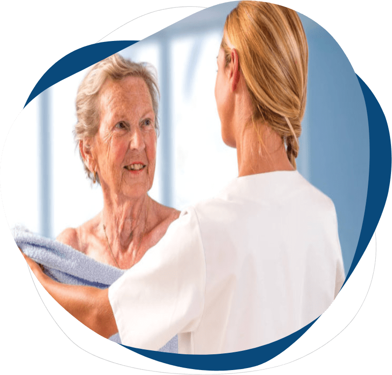 A woman is holding onto something in front of her face.